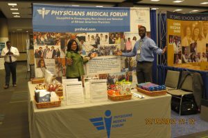 PMF 2017 SNMA AMEC Photo Dr. Peters & Justin at booth